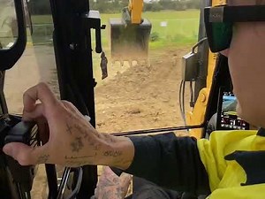 Caterpillar 308 Next Gen Excavator -loading trucks-