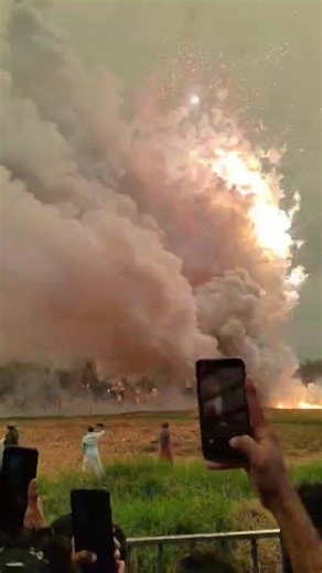 Daytime fireworks, such as at Kerala Pooram, creating dramatic smoke and sound effects