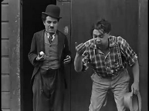 Charlie Chaplin . The Tramp (1915 Restored Silent Short Film Noir Comedy)
