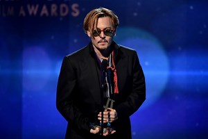 Depp slurs after 'falling off wagon' at ceremony but claims he's on meds