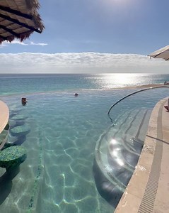Take this well-deserved break. Dive into the infinity pool and let your palate be captivated by our expert mixologists. | Grand Solmar Land's End Resort & Spa Cabo San Lucas