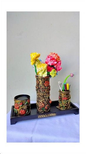 A Table Tray with flower pot, pencil stand and wrist watch holder.