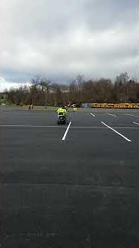 Parking Lot Striping: Painting single line double row parking spaces.