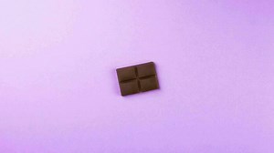 Stopmotion animation piece of chocolate. A piece of chocolate jumps