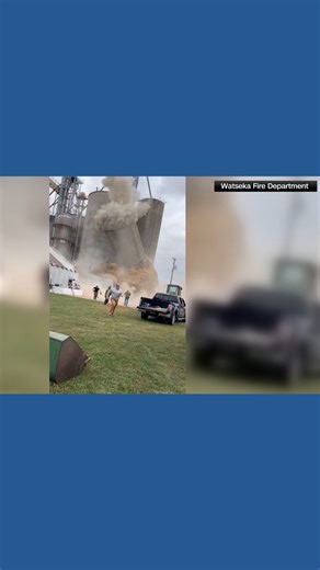 Workers in rural Illinois run from farm silo collapse