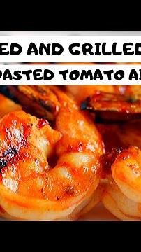 Grilled shrimp. Marinated shrimp cooked on a BBQ. Roasted tomato aioli. Restaurant recipe. (shrimp)