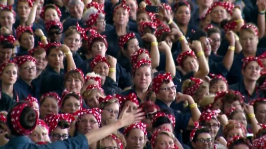WE CAN DO IT!: Women dressed as ‘Rosie the Riveter’ at the Old Willow Run Bomber Plant in Michigan where many ‘Rosies’ worked during World War II, have set a new Guinness World Record. | NBC Nightly News with Tom Llamas