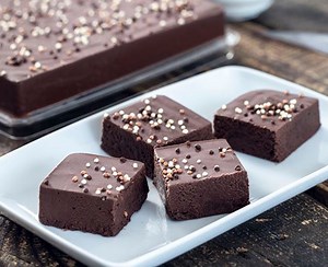 This Chocolate Fudge with cocoa powder is by far the best chocolate fudge ever. I've been making this easy homemade chocolate fudge recipe for years and everybody loves it. You can add nuts, spices, different extracts or dried fruits to suit your tastes and make a different chocolate fudge each time. | Home Cooking Adventure
