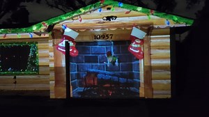 Here's a reel I put together several years ago prior to the house being painted, smaller bushes still in front, and with my first projector (ViewSonic px706HD). This is probably a closer and more reaslistic example of what the typical house looks like without changing it all for projections like I did. | FX Projections