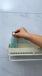 Install a suction cup shelf like this on your bathroom shelf, and you can place all kinds of toiletries, toothbrushes, and cups on it | MYK