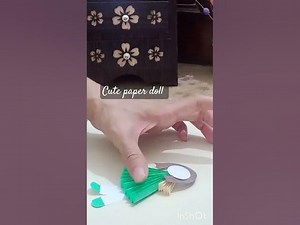 Cute paper doll by using colourful papers