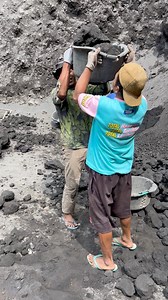 Crushing black rock | The Rock Man