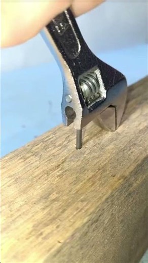 How to Pull a Nail Using an Adjustable Wrench