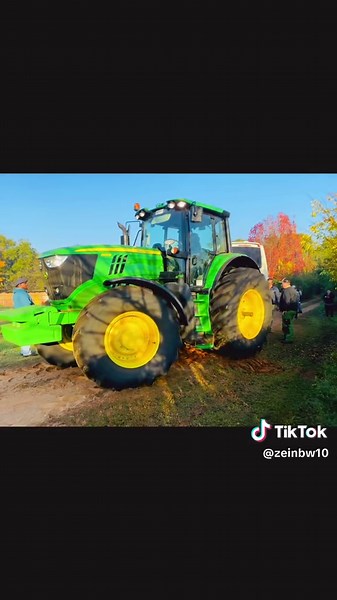 John Deere Tractor Rescues Stuck Bus Effortlessly