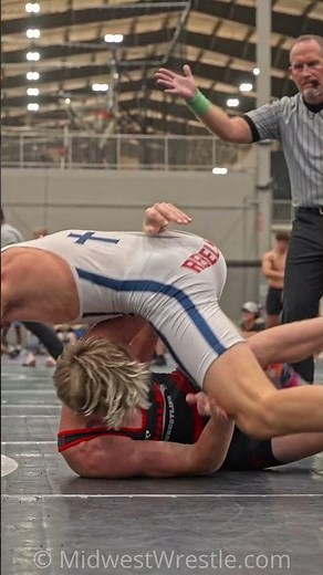 Blake Getz of Roncalli, Indiana puts a two-time Illinois state champion on his back