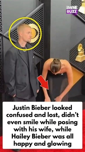 At Grammys Justin Bieber looked confused and lost on the red carpet, didn’t even smile while posing with his wife, while Hailey Bieber was all happy and glowing #Grammys2026 #GRAMMYs #hollywood #fashion #justinbieber #haileybieber #music #trendingvideo | IWMBuzz
