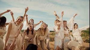 4k slow motion happy female enjoying life on camera. Positive emotions. Crowd of woman with positive emotions dancing on camera. Country and ethnic style music festival.