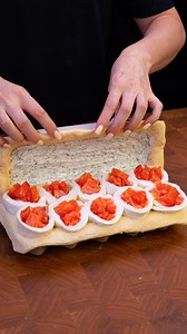 The famous puff pastry appetizer that's taking the world by storm Ingredients puff pastry: 700 g (25 oz) flour: 20 g (0.7 oz) mozzarella balls: 10 pc salmon: 400 g (14 oz) cheese cream: 300 g (11 oz) dill: 20 g (0.7 oz) salt: 2 g (0.1 oz) eggs: 1 pc sesame seeds: 5 g (0.2 oz) Greek yogurt: 160 g (5.6 oz) olive oil: 100 ml (3.4 fl oz) scallions: 10 g (0.4 oz) parsley: 10 g (0.4 oz) garlic: 10 g (0.4 oz) lemon: 1 pc green olives: 100 g (3.5 oz) salt: 2 g (0.1 oz) | Appetizing.tv