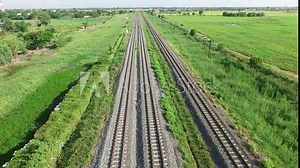 aerial view from flying drone of railroad tracks, train