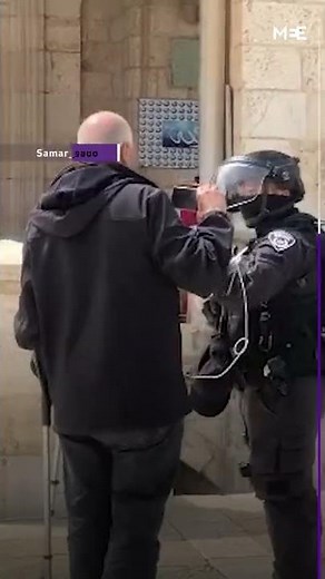 Israeli forces attack Palestinian father and man on crutches in al-Aqsa