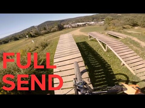 Hitting the BIG mtb jump line features at the downhill Bike Park