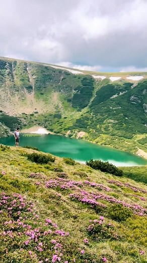 Romania on Instagram: "What’s more breathtaking than a panoramic mountain view? Nestled in the heart of Romania, Cindrel Peak offers a view that is nothing short of spectacular, especially when looking towards Iezerul Mare Lake. This stunning vista captures the essence of the Carpathian wilderness, blending rugged peaks with serene water landscapes, a true testament to the untouched beauty of this region. Cindrel Peak stands proudly at 2,244 meters, part of the larger Cindrel Mountains in the So