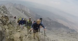 Paralyzed St. Luke's doctor summits Borah