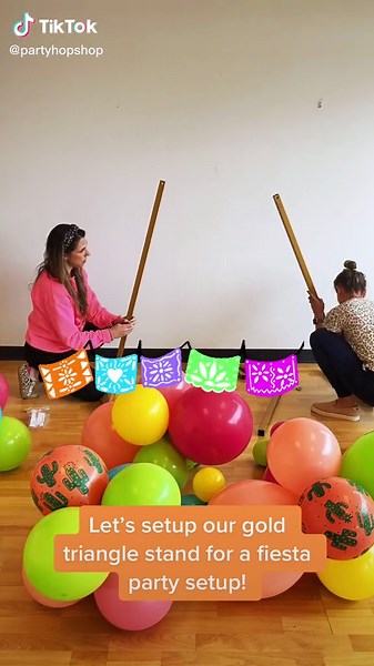 Setting up a Gold Triangle Stand for Your Fiesta Party