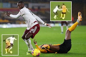 Watch Arsenal's Pepe nutmeg TWO defenders before scoring screamer against Wolves