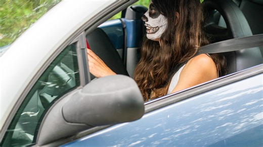 Find out if it's illegal to wear Halloween fancy dress while driving your car