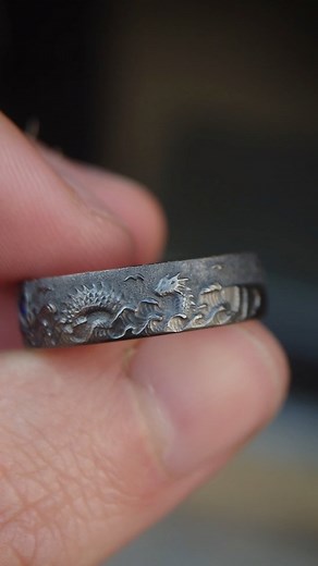 Andrew Ashcroft on Instagram: "Hand engraved tantalum sea dragon scene ring. Each ring is hand made to order, DM for more information or to be added to our waiting list (probably 2026 now)."