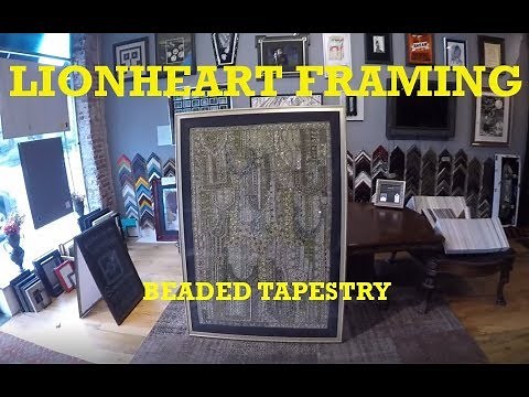 Stitch mounting and framing a large beaded tapestry. LIONHEART FRAMING