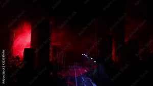 Empty street of burnt up city, flames on the ground and blasts with smoke in the distance. Apocalyptic view of city downtown as disaster film poster concept. Night scene. City destroyed by war. Stock Video