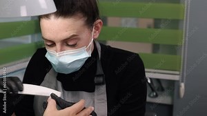 manicure process, Manicurist filing, nail salon. Finger manicure, manicure craft, nail file, manicuring client's nails, spa treatment.