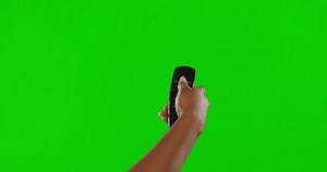 clip-1102344147-hand-remote-control-green-screen-change-channel