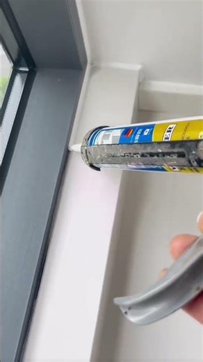 the process of filling gaps in window frames