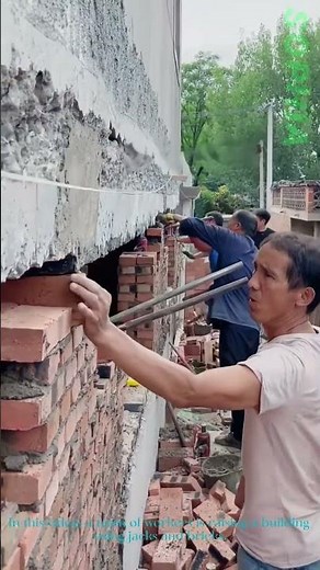Building Lifting: The Process of Raising a House with Jacks and Bricks