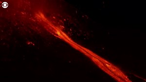 WATCH: Spectacular explosions lit up the sky on Thursday as Europe's most active volcano, Mount Etna, burst into action. The volcano has had spurts of activity for the last few weeks, with ash precipitation shutting down the nearby Catania airport on Tuesday. | CBS News