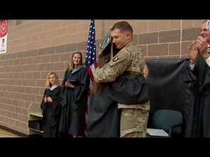 Soldier surprises sister at graduation