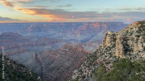 Grand Canyon National Park sunset timelapse filmed in Arizona. This beautiful 4K footage features a stunning blue hour and golden hour sunset over the iconic canyon with its majestic rock formations.