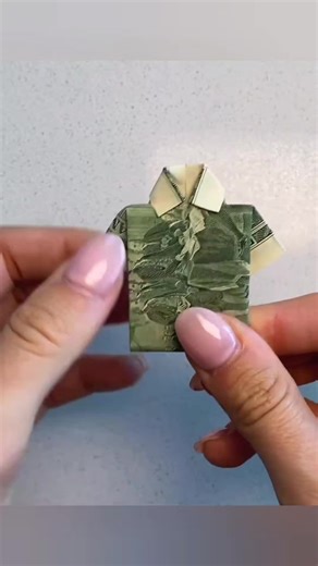 How to fold a dollar bill into a Beautiful Shirt 😁🎽 #dollarorigami #artandcraft #dollar #origami #shirt