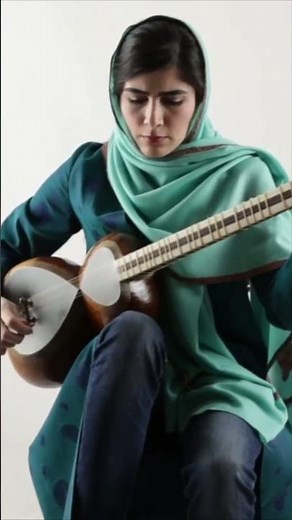 The strings whisper secrets of tradition. Witness true Persian Tar mastery!