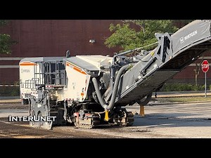 Wirtgen W 210 Fi cold milling machine removing asphalt