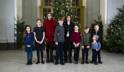 Queen Silvia of Sweden joined by grandchildren to decorate palace trees