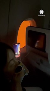 6.7K views · 142 reactions | Passenger view: A passenger aboard a plane in Tokyo recorded the terrifying moments the plane burst into flames following a deadly collision with a Japanese coast guard aircraft on a mission to deliver earthquake relief goods. https://bit.ly/4aEOkv3 | AccuWeather | Facebook