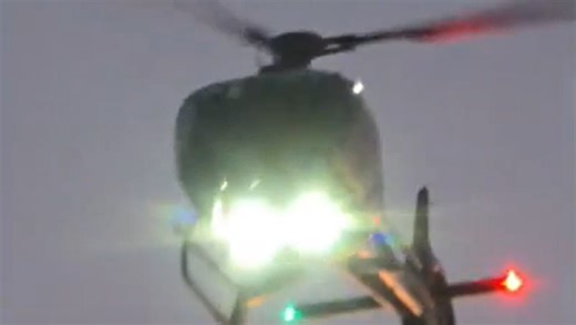 Terrifying moment a helicopter crashes near a busy US freeway