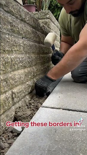 Brick borders install for new garden patio