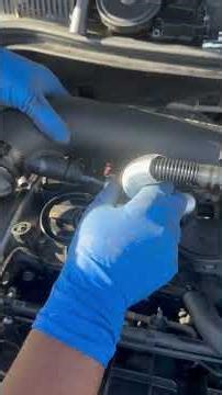 Removing the intake tube so I can replace a purge valve part on a 12 Volkswagen cc 2 L turbo