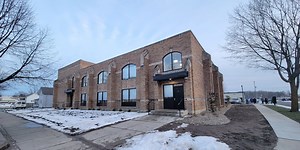 Old Merrill High School building redeveloped into apartment complex