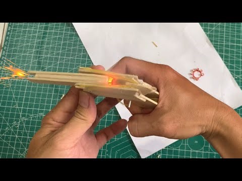 Ice cream stick gun toy that can shoot Ring Caps
